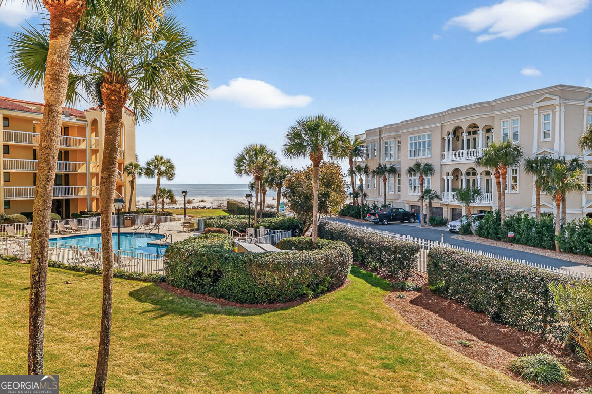 201 Neptune Road, Unit 258 St. Simons, GA 31522 - Photo 50 of 52 a view of a swimming pool with a patio
