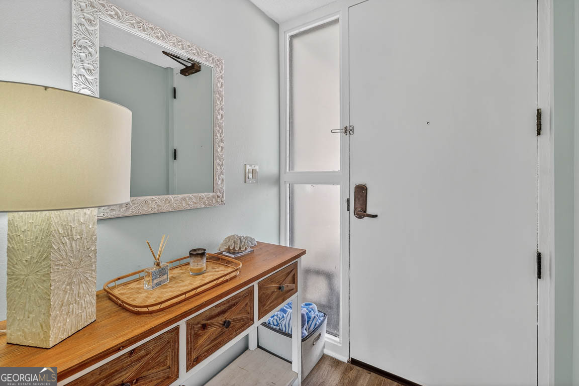 201 Neptune Road, Unit 258 St. Simons, GA 31522 - Photo 9 of 52 a room with storage and utility