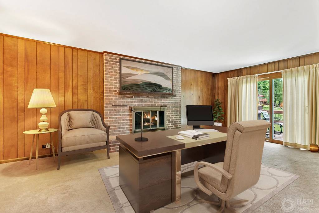 33 Ferndale Road Deer Park, IL 60010 - Photo 12 of 31 a living room with furniture a fireplace and a flat screen tv