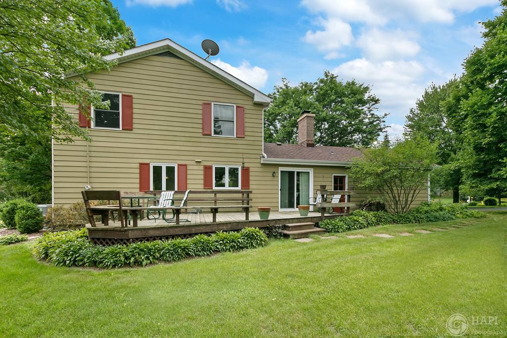 33 Ferndale Road Deer Park, IL 60010 - Photo 29 of 31 a view of a house with a yard patio and fire pit