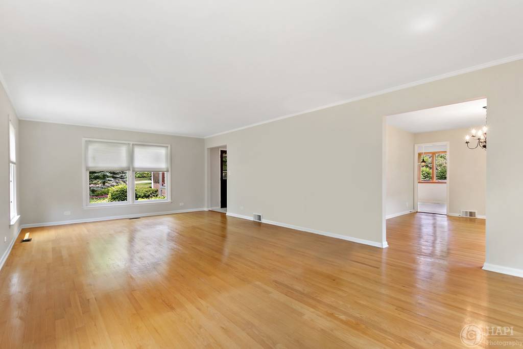 33 Ferndale Road Deer Park, IL 60010 - Photo 4 of 31 an empty room with wooden floor and windows