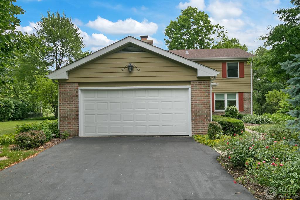 33 Ferndale Road Deer Park, IL 60010 - Photo 31 of 31 a front view of a house with a yard and garage