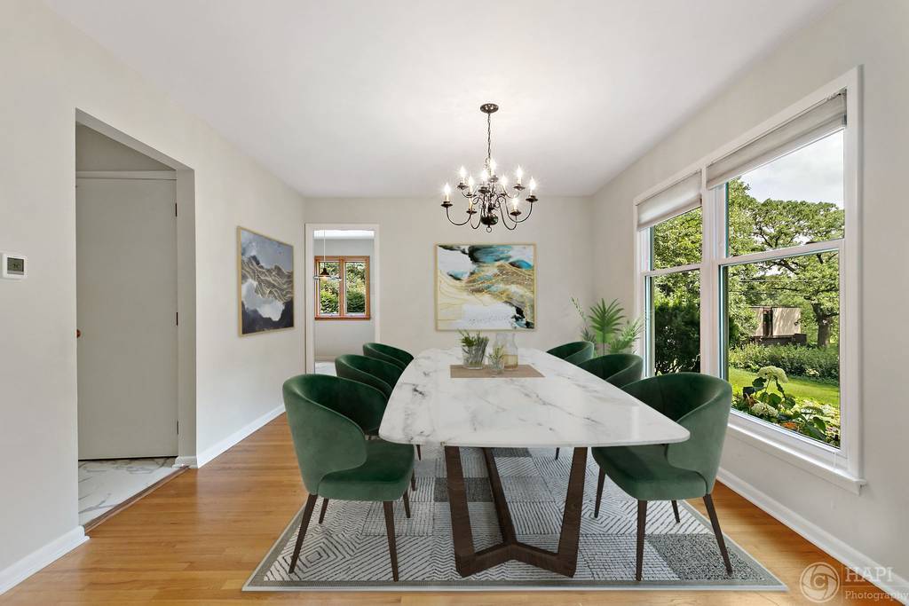 33 Ferndale Road Deer Park, IL 60010 - Photo 6 of 31 a view of a dining room with furniture a rug and wooden floor
