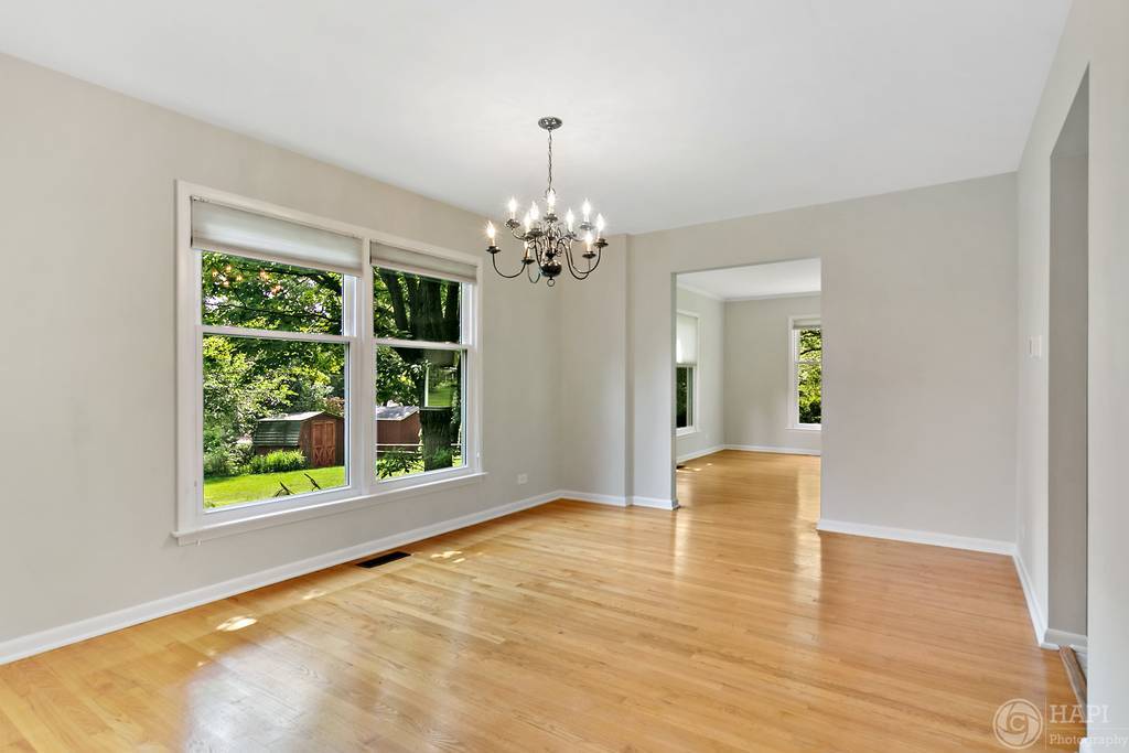 33 Ferndale Road Deer Park, IL 60010 - Photo 8 of 31 a view of an empty room with wooden floor and a window