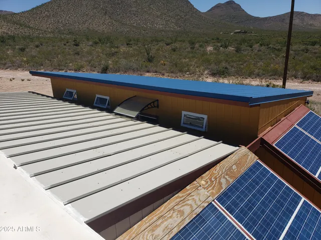 a house view with a backyard space