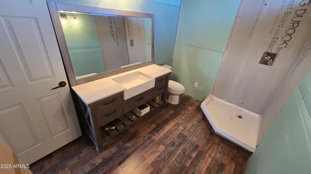 a view of an empty room with a fireplace