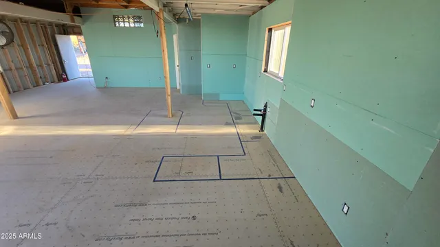 a view of a yard with a tree