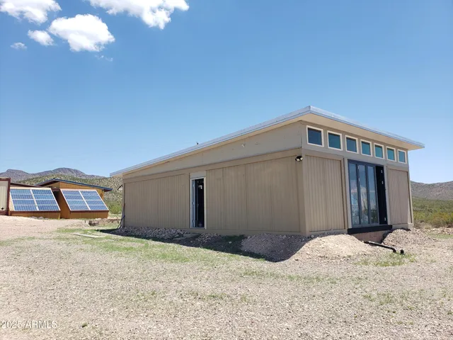 a view of a house with a roof