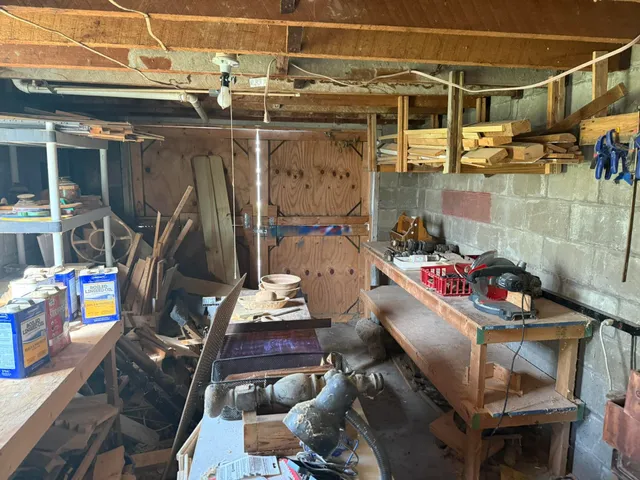 a outdoor living space with furniture and a potted plant