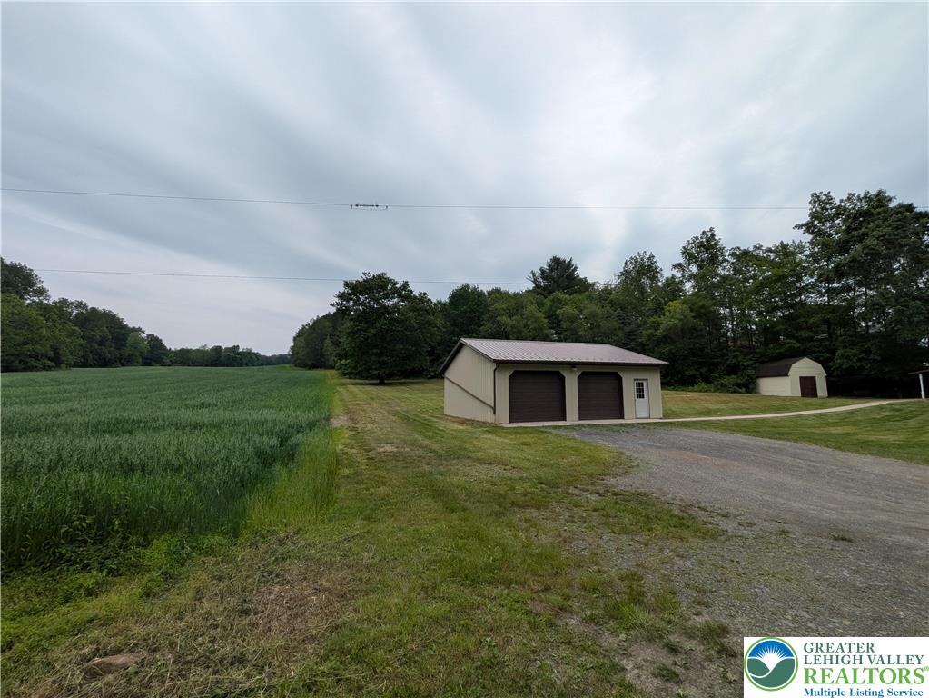 124 Sterling Valley Road Kunkletown, PA 18058 - Photo 12 of 29 a house view with a garden space