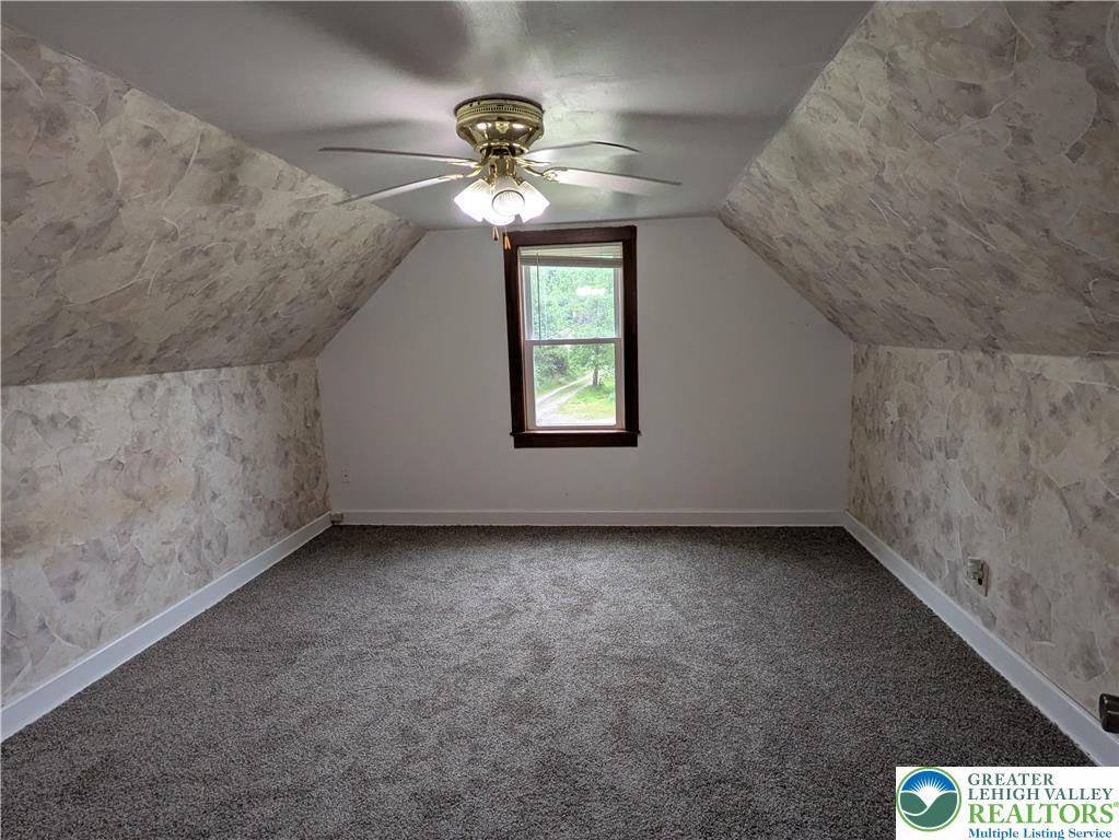 124 Sterling Valley Road Kunkletown, PA 18058 - Photo 20 of 29 a view of a livingroom with a ceiling fan
