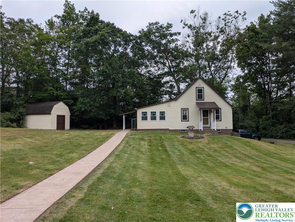 124 Sterling Valley Road Kunkletown, PA 18058 - Photo 2 of 29 a front view of a house with yard