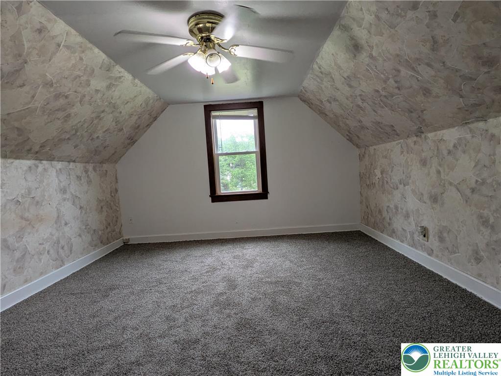 124 Sterling Valley Road Kunkletown, PA 18058 - Photo 22 of 29 en empty room with windows and ceiling fan