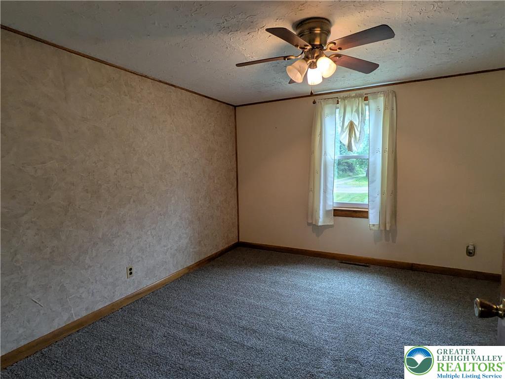124 Sterling Valley Road Kunkletown, PA 18058 - Photo 24 of 29 wooden floor in an empty room with a window