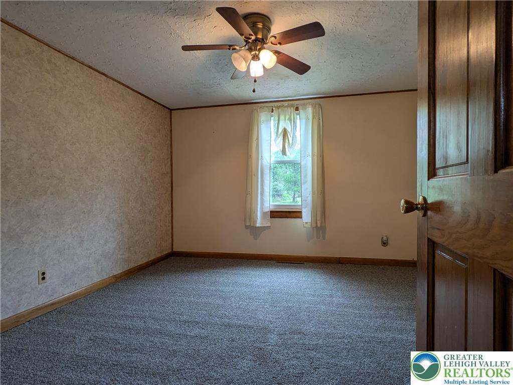 124 Sterling Valley Road Kunkletown, PA 18058 - Photo 26 of 29 a view of an empty room with a window