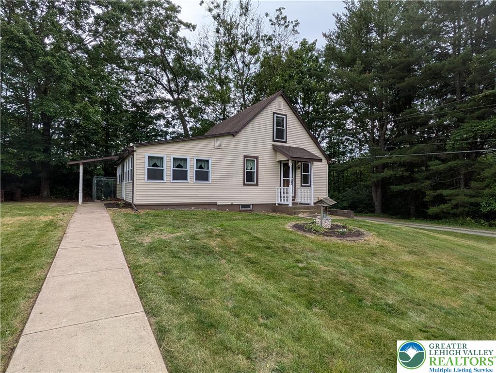 124 Sterling Valley Road Kunkletown, PA 18058 - Photo 4 of 29 a front view of a house with a yard