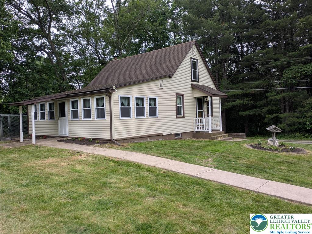 124 Sterling Valley Road Kunkletown, PA 18058 - Photo 5 of 29 a front view of a house with a garden