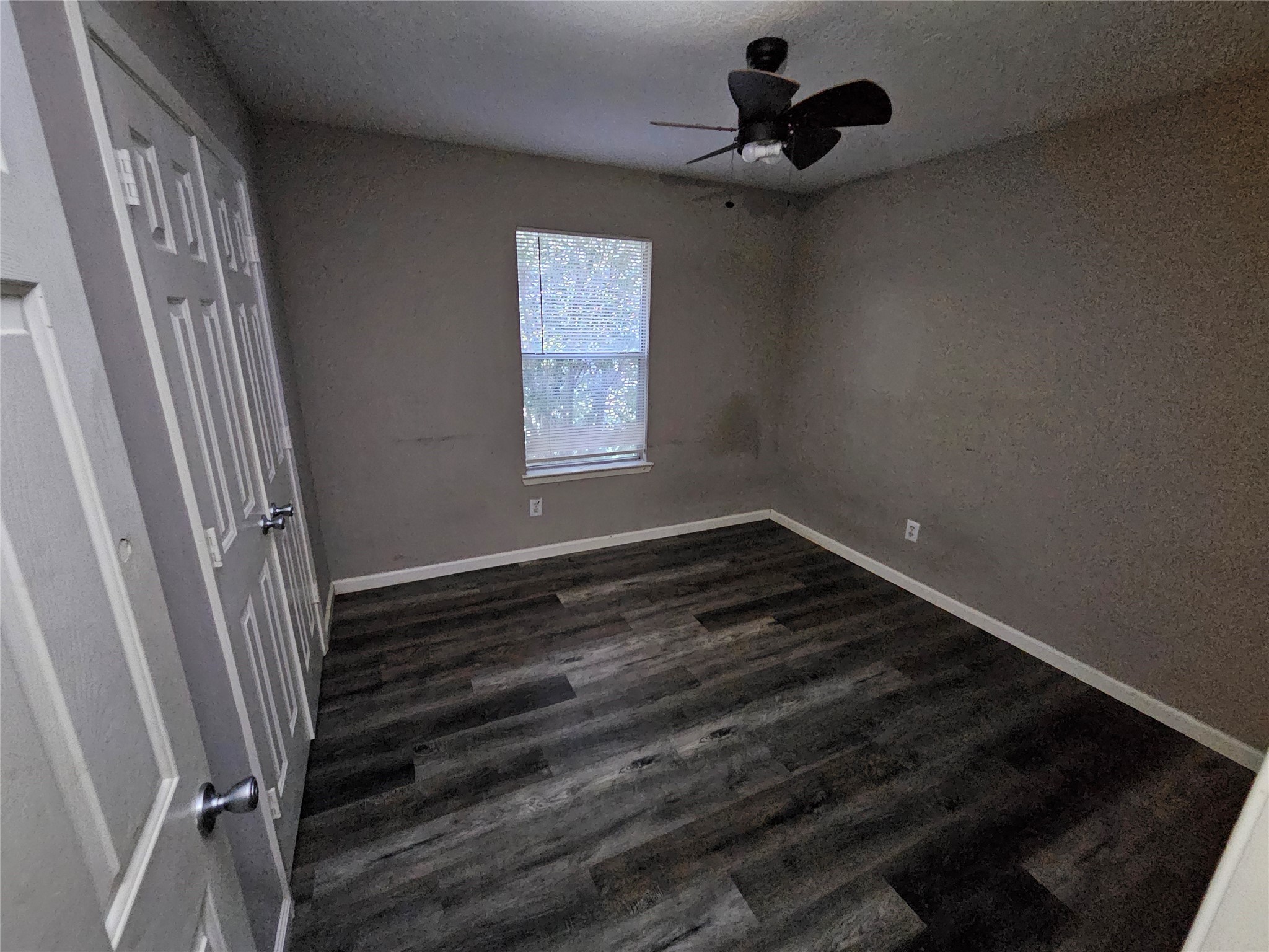 6319 Nullarbor Court Katy, TX 77449 - Photo 19 of 24 a view of room with window and hardwood floor