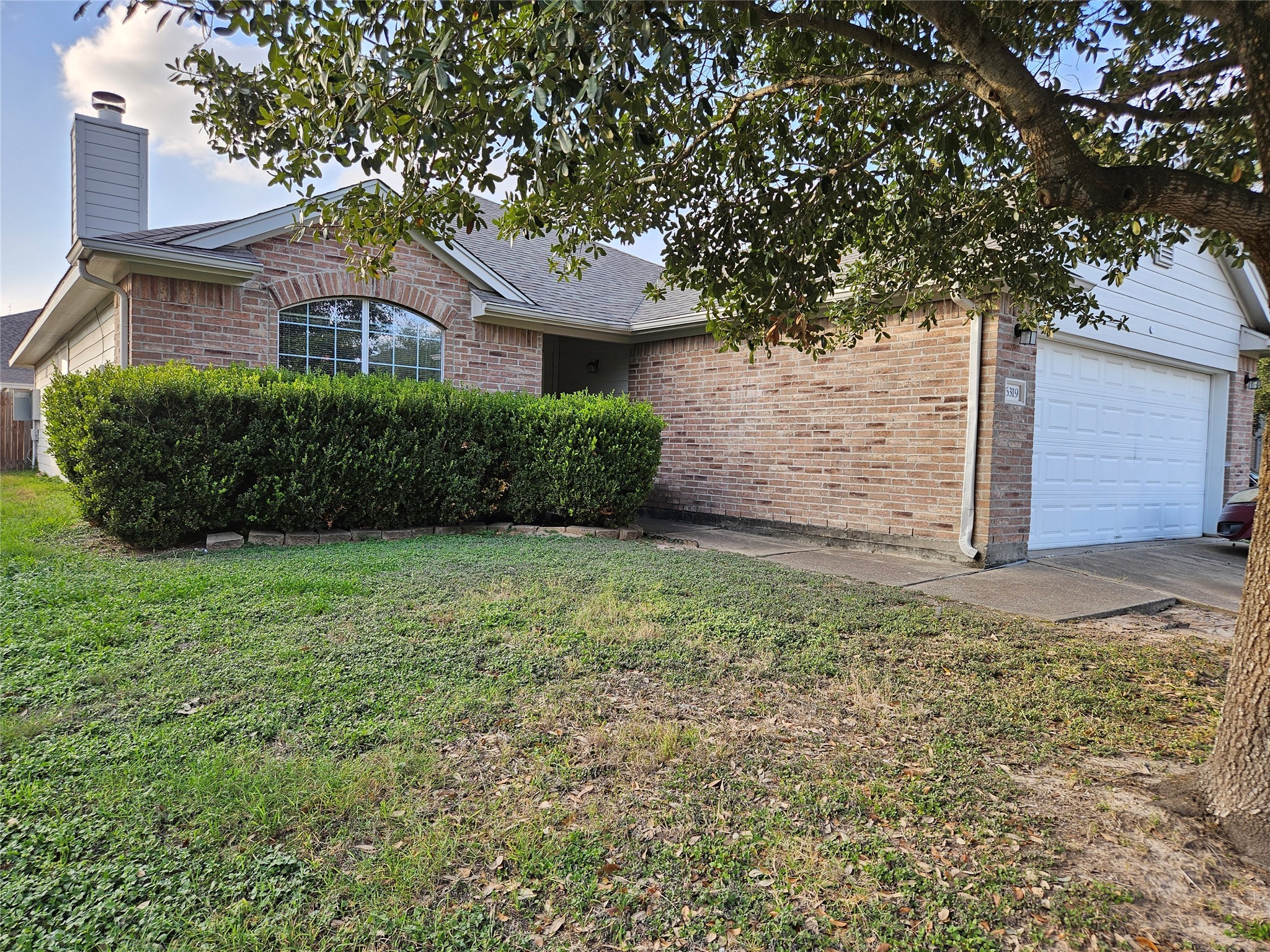 6319 Nullarbor Court Katy, TX 77449 - Photo 2 of 24 a front view of a house with garden