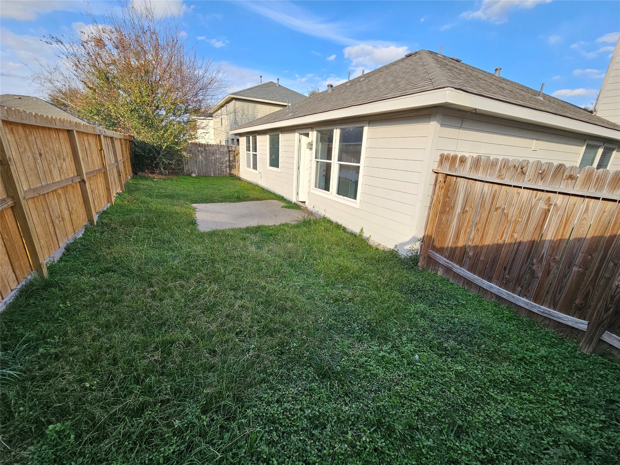 6319 Nullarbor Court Katy, TX 77449 - Photo 23 of 24 a view of backyard of house with green space