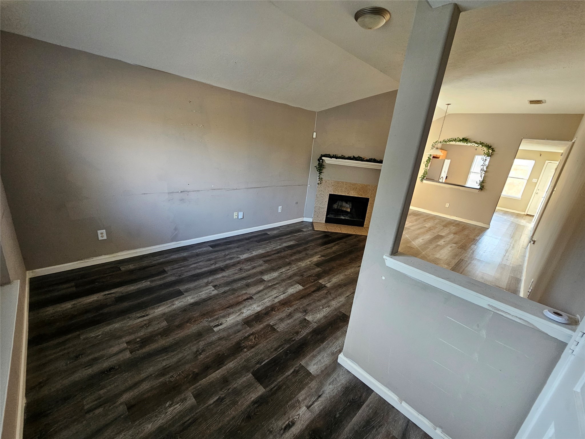 6319 Nullarbor Court Katy, TX 77449 - Photo 5 of 24 a view of an empty room and wooden floor