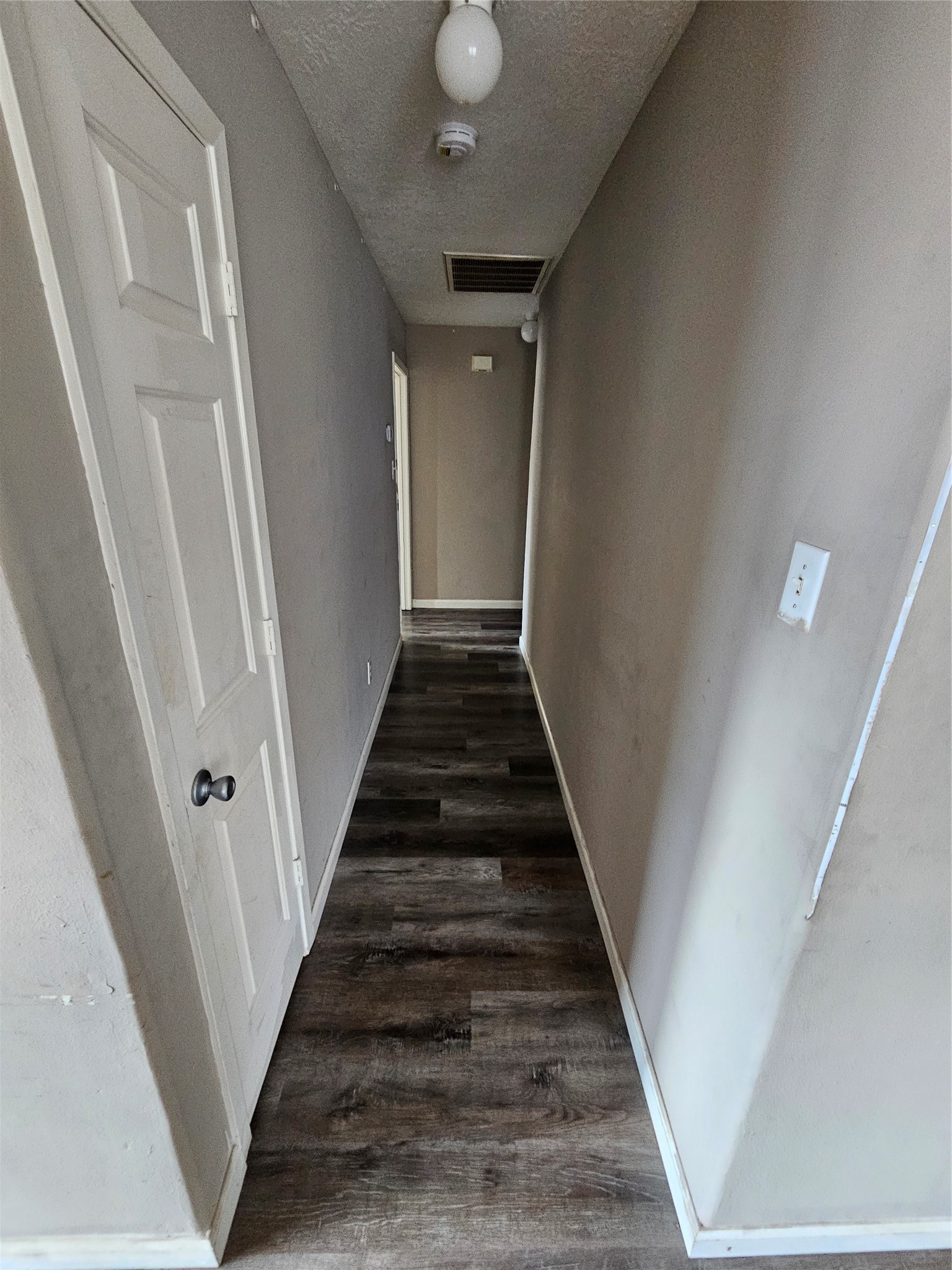 6319 Nullarbor Court Katy, TX 77449 - Photo 10 of 24 a view of a hallway with a staircase