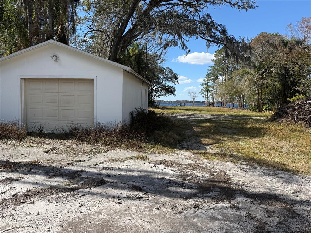 12518 Lake Mary Jane Road Orlando, FL 32832 - Photo 15 of 33 a view of a house with a yard