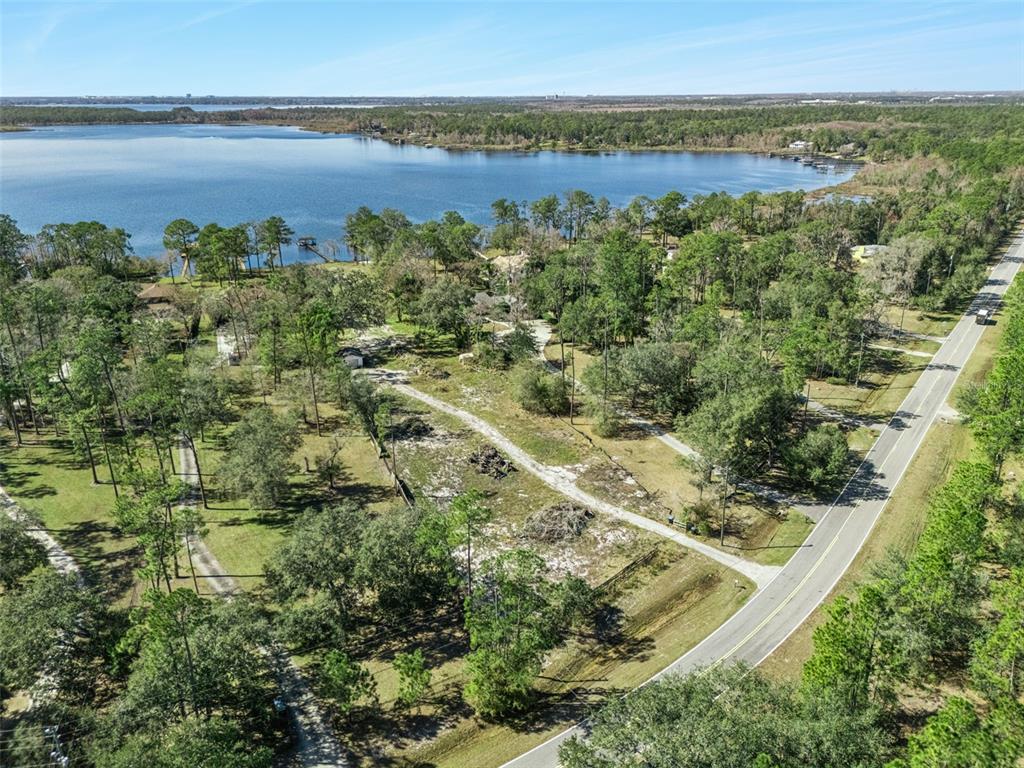12518 Lake Mary Jane Road Orlando, FL 32832 - Photo 29 of 33 a view of a lake with a city