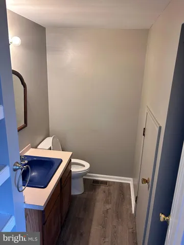 a bathroom with a sink and a toilet