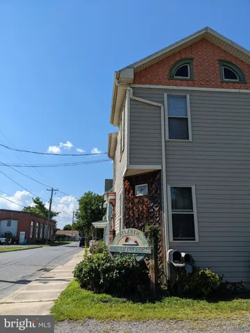 a front view of house with yard