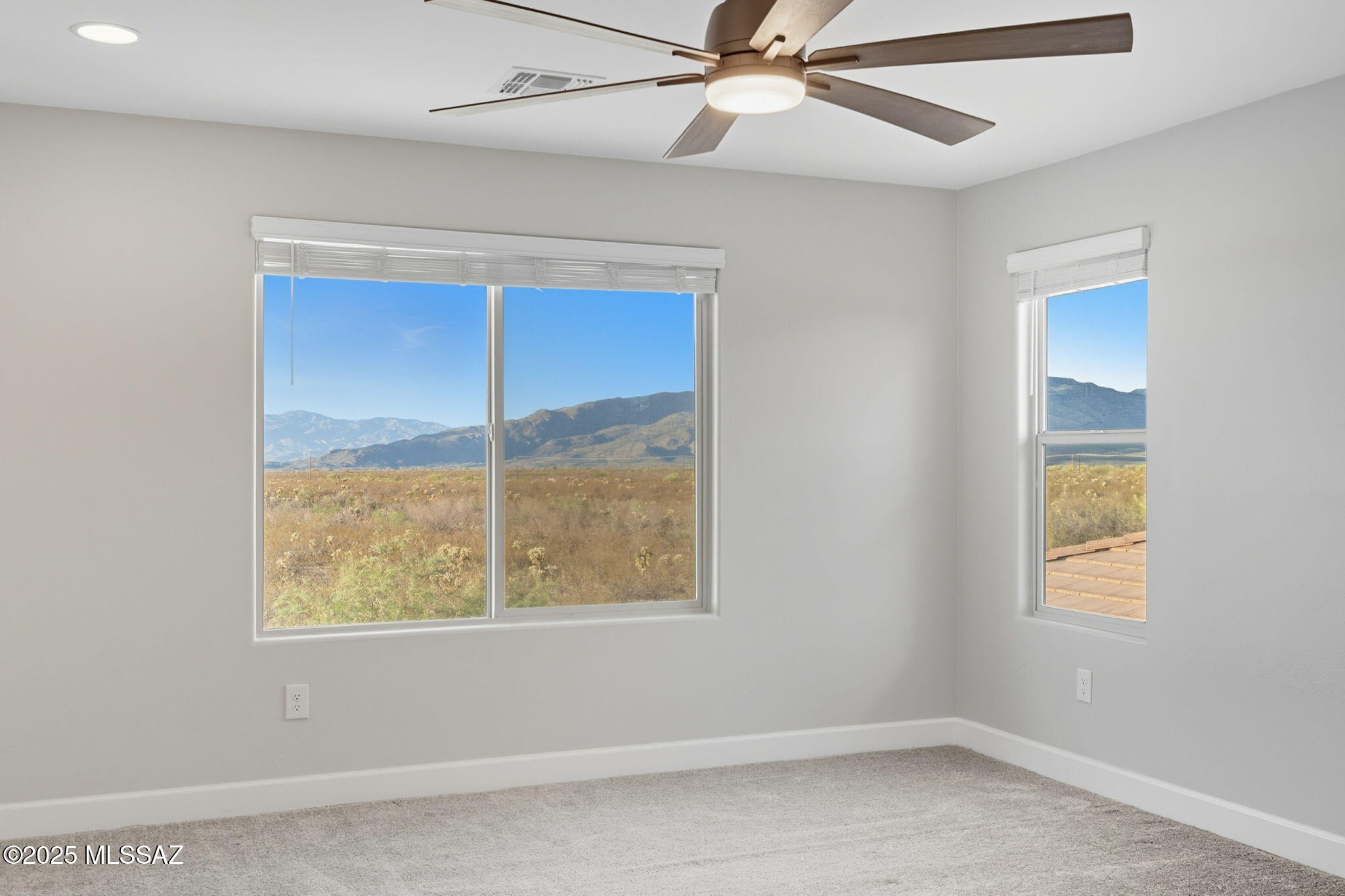 12100 East Ryscott Circle Vail, AZ 85641 - Photo 26 of 53 an empty room with a window