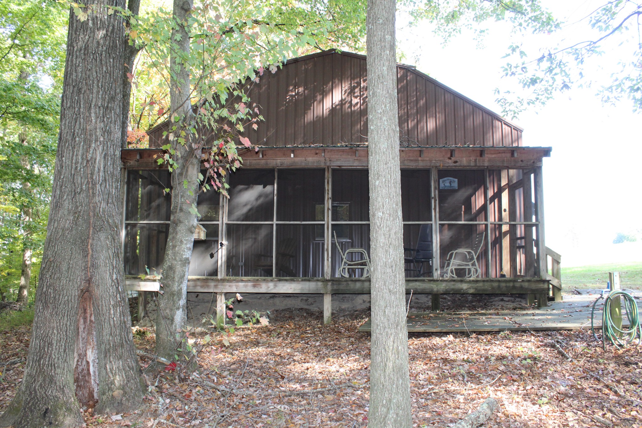 249 Claude Fox Road Lafayette, TN 37083 - Photo 24 of 68 a house view with a outdoor space