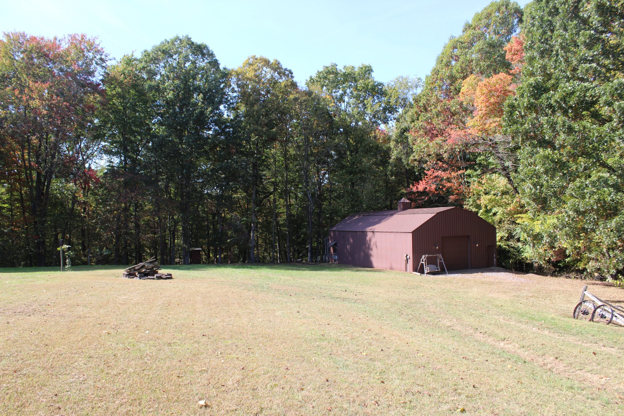 249 Claude Fox Road Lafayette, TN 37083 - Photo 36 of 68 a view of outdoor space with large trees