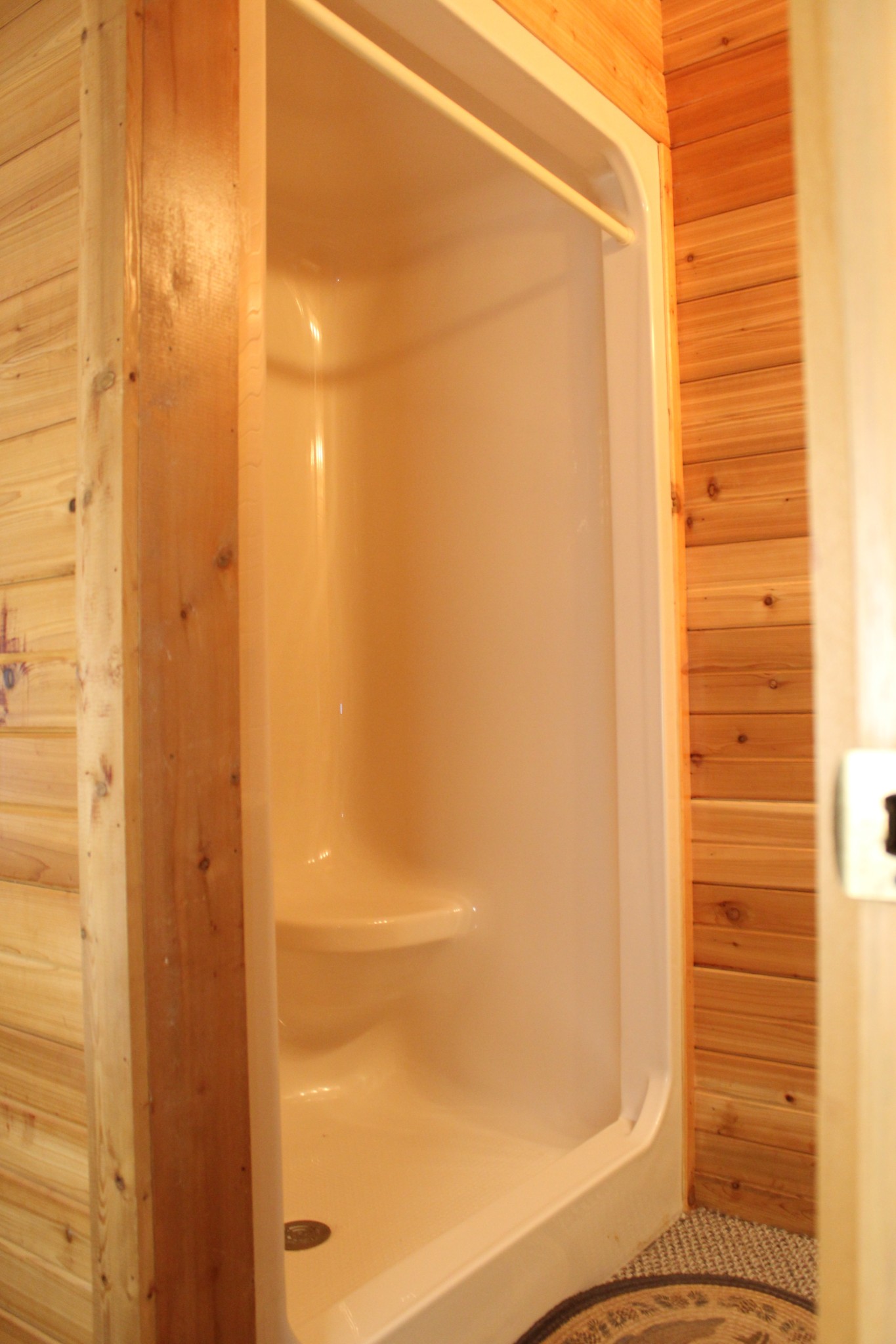 249 Claude Fox Road Lafayette, TN 37083 - Photo 52 of 68 a bathroom with a glass door shower