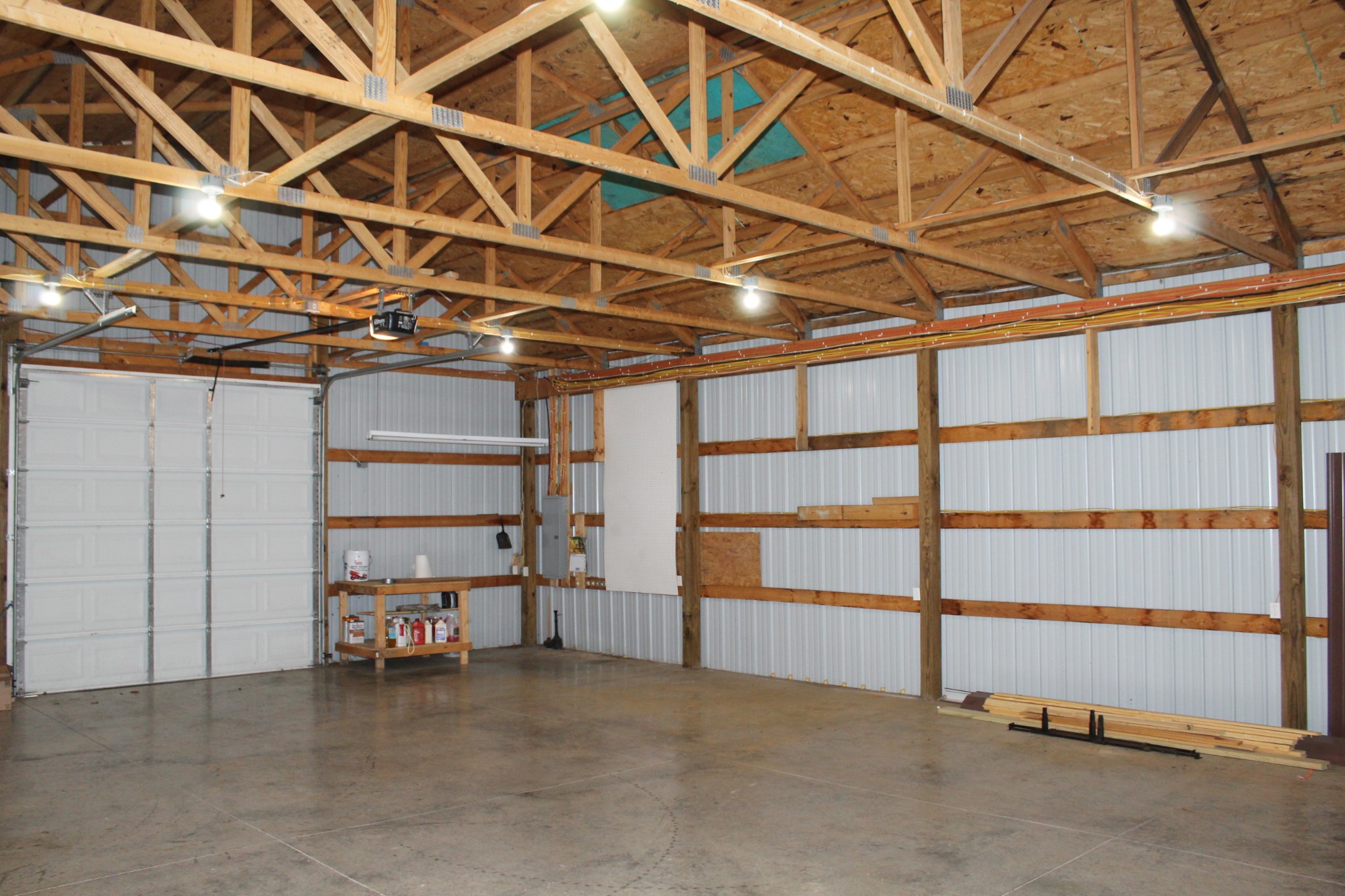 249 Claude Fox Road Lafayette, TN 37083 - Photo 61 of 68 a view of a room with racks on the wall