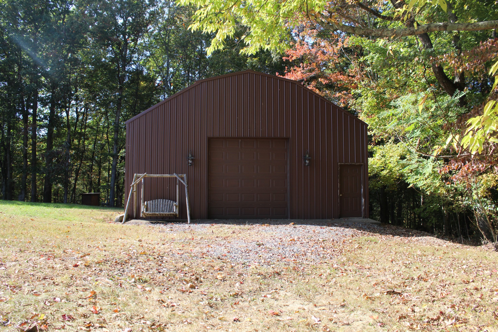 249 Claude Fox Road Lafayette, TN 37083 - Photo 8 of 68 a house with trees in the background