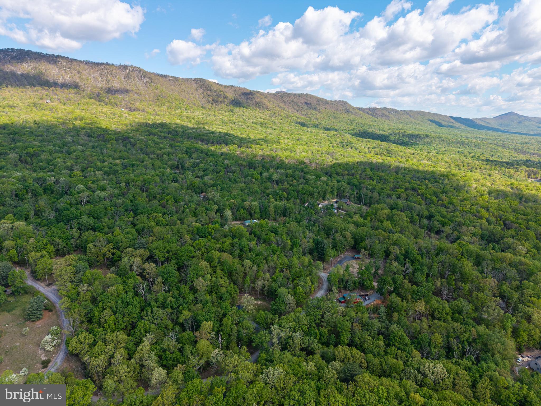 H49 Cross Creek Road Luray, VA 22835 - Photo 18 of 46 a view of an aerial view of residential houses with outdoor space and trees