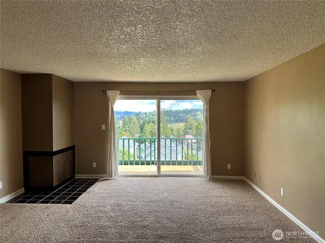 a balcony view with a glass door