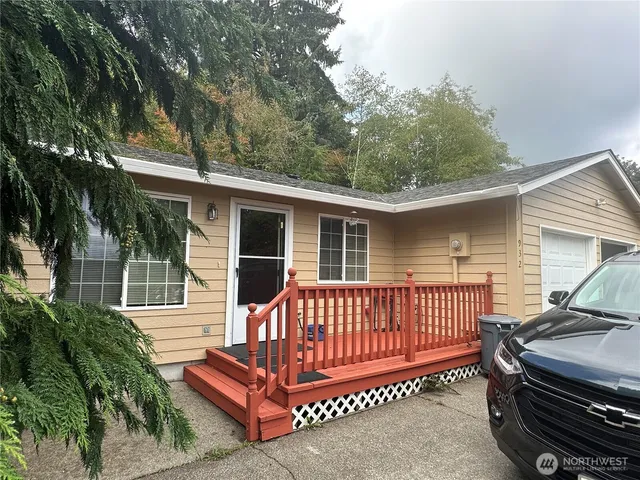 a house view with a backyard space