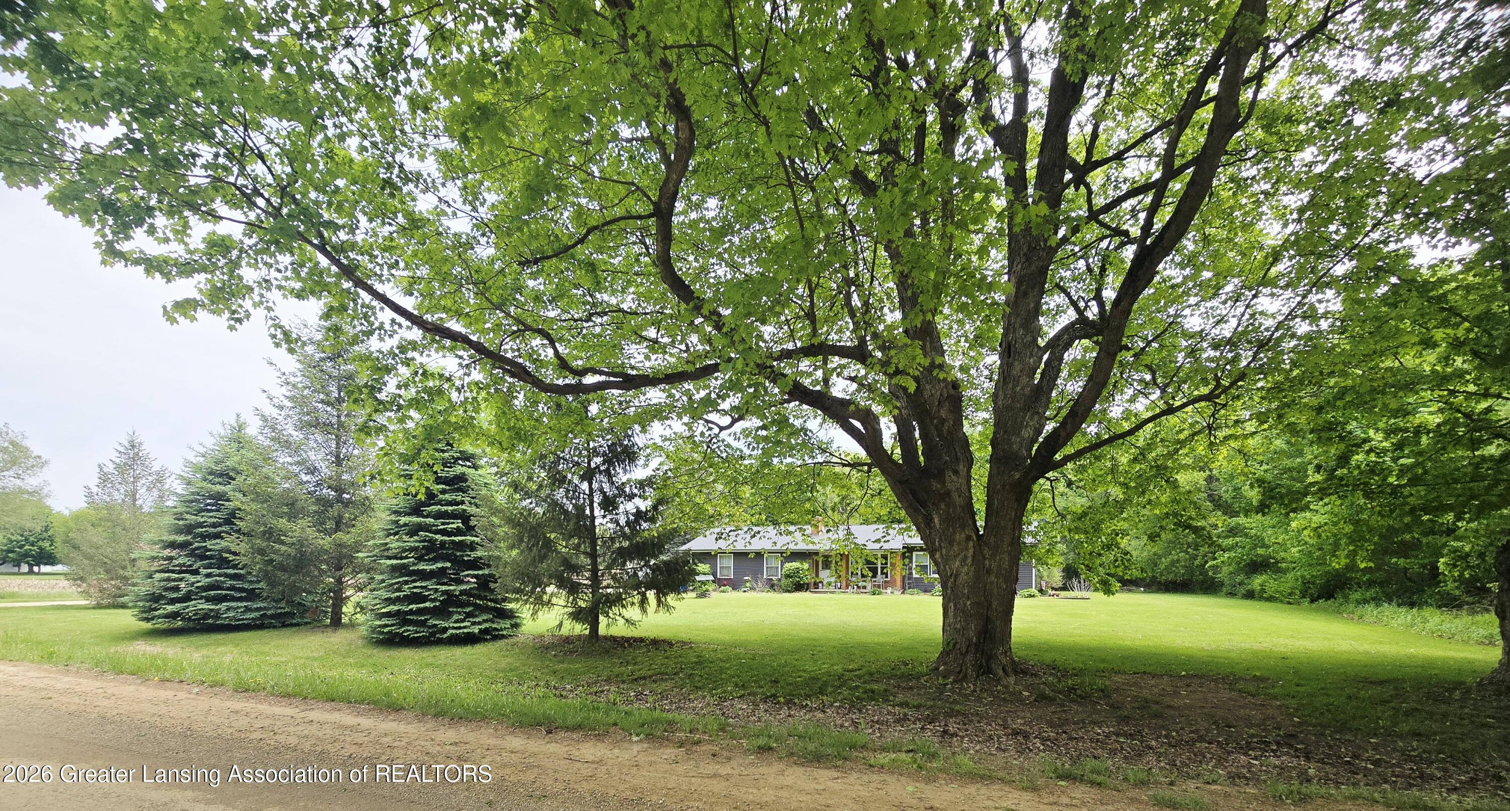 7694 North Meridian Road Elsie, MI 48831 - Photo 1 of 41 Meridian Rd front