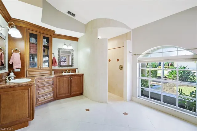 a bedroom with a bed and a desk