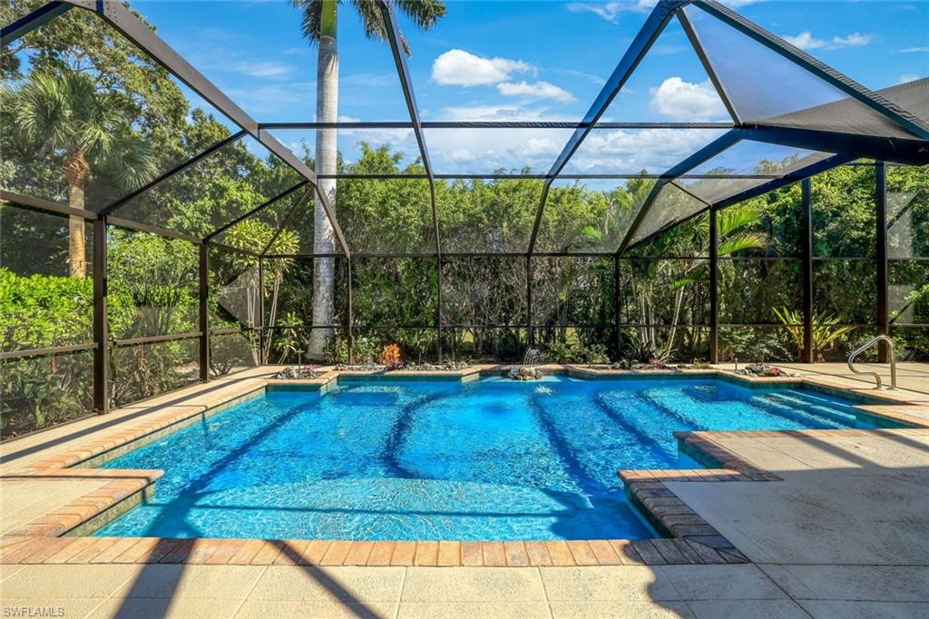 146 Muirfield Circle Naples, FL 34113 - Photo 27 of 31 a view of outdoor space with swimming pool
