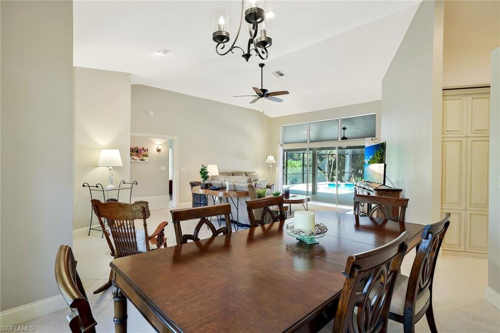 146 Muirfield Circle Naples, FL 34113 - Photo 10 of 31 a view of a dining room with furniture
