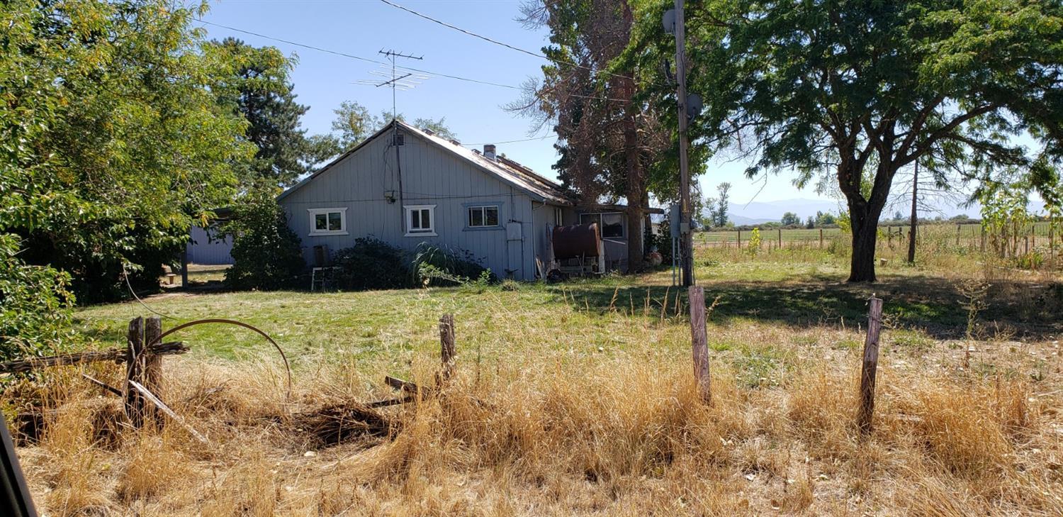 1421 Reese Creek Road Eagle Point, OR 97524 - Photo 16 of 34 a swimming pool in middle of the house