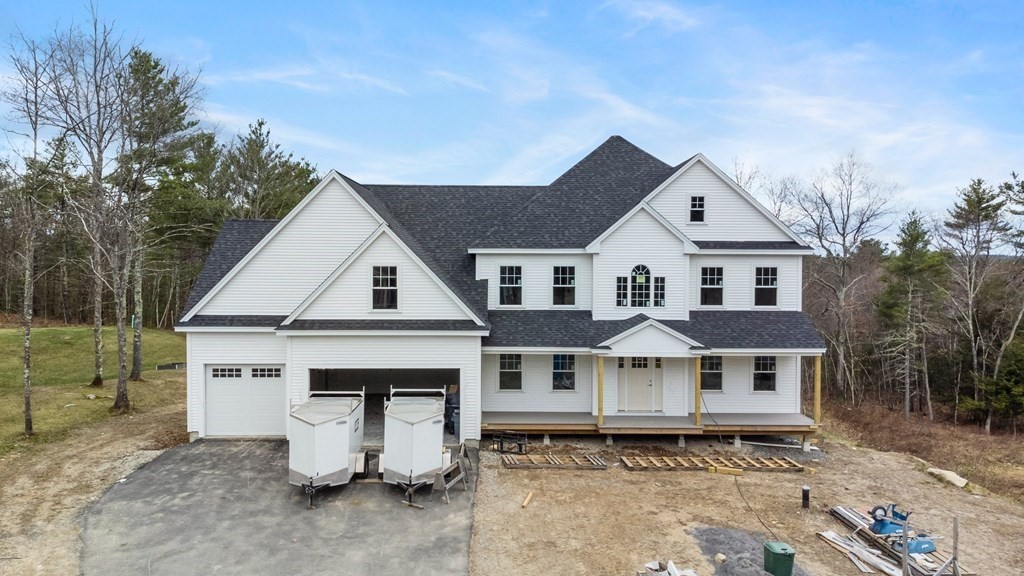 30 Highclere Road Windham, NH 03087 - Photo 2 of 6 a view of a house with yard