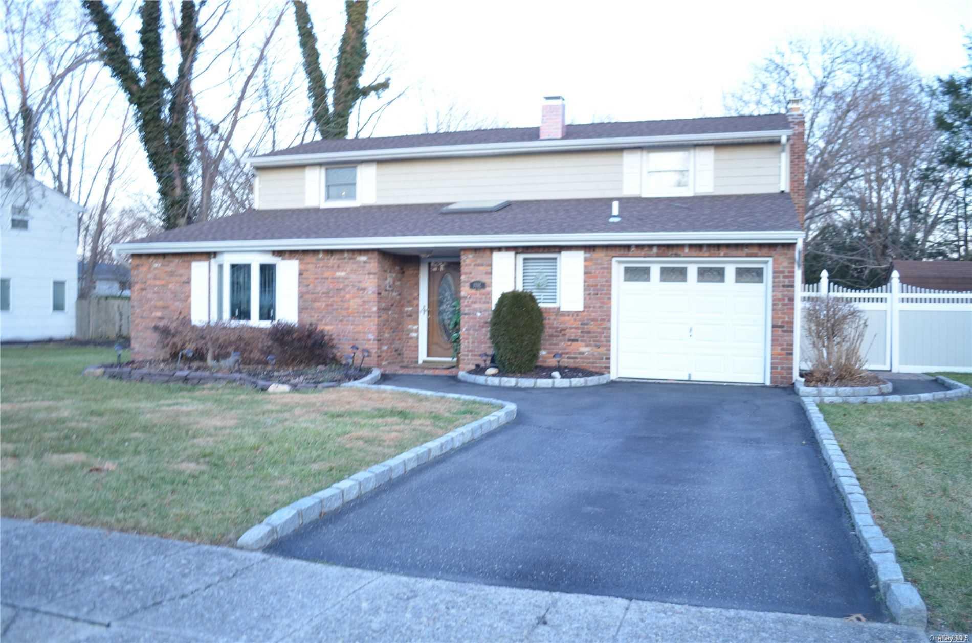 front view of a house and a yard