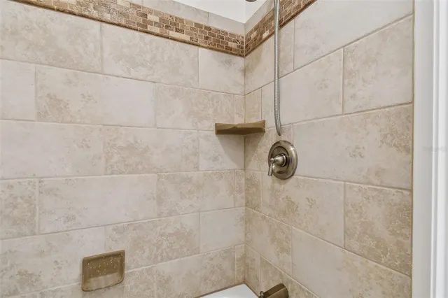a utility room with cabinets