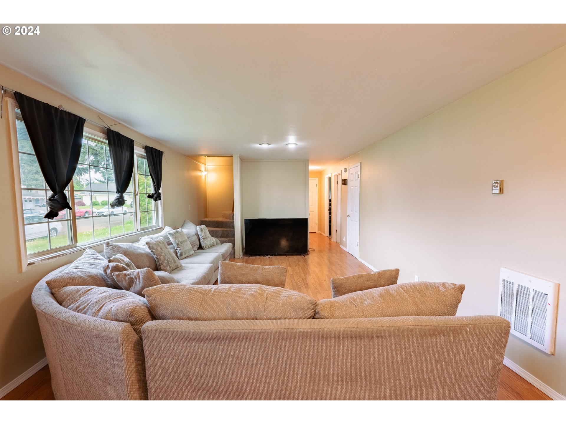 9111 Northeast 73rd Street Vancouver, WA 98662 - Photo 11 of 33 a living room with furniture and a flat screen tv