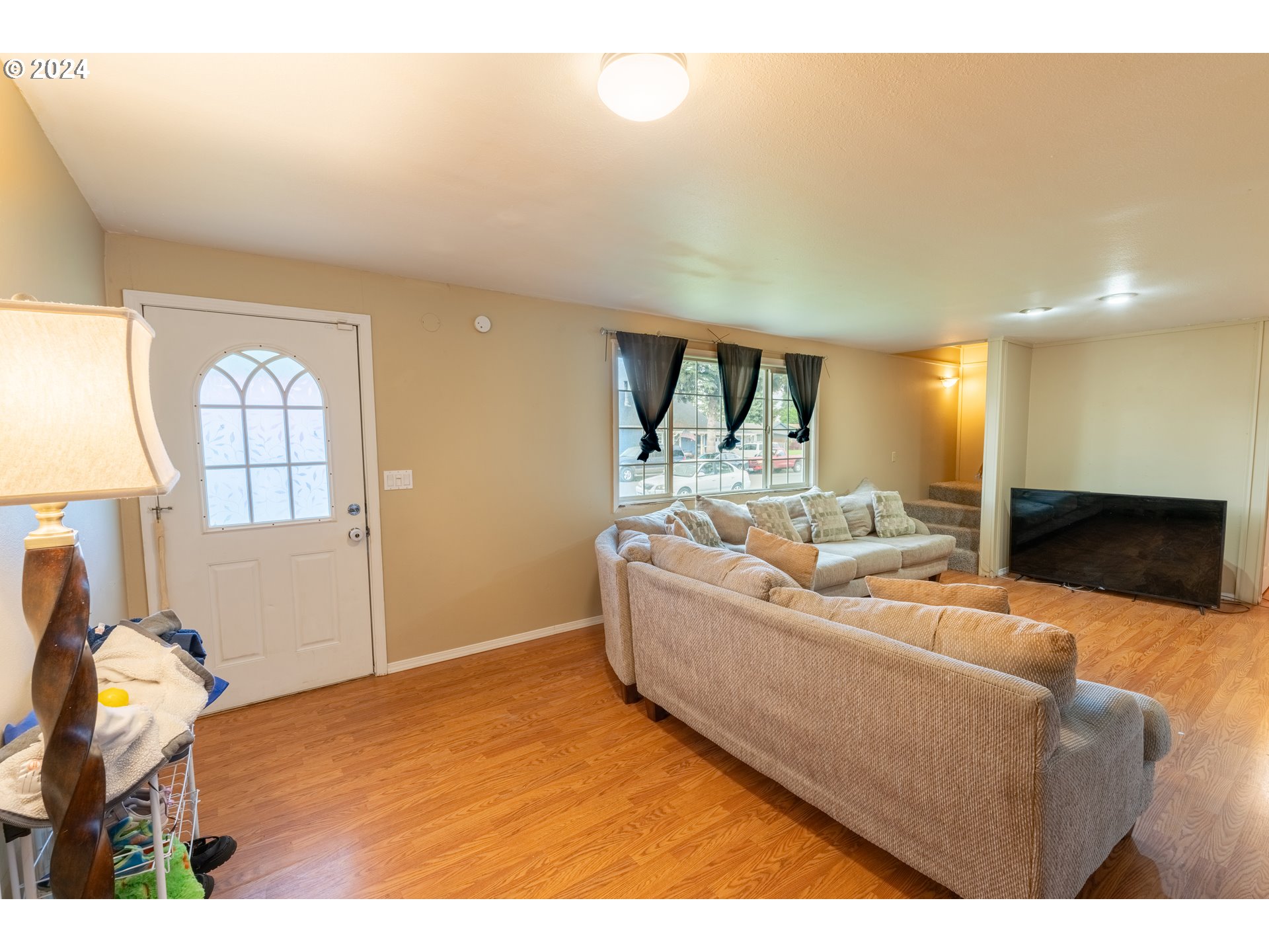 9111 Northeast 73rd Street Vancouver, WA 98662 - Photo 12 of 33 a living room with furniture and a flat screen tv