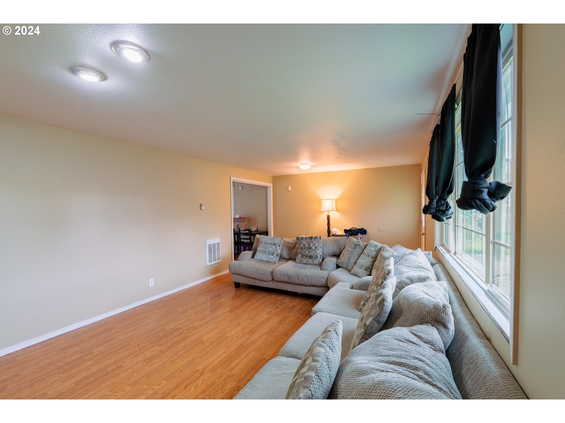 9111 Northeast 73rd Street Vancouver, WA 98662 - Photo 15 of 33 a living room with furniture and a flat screen tv